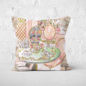 Cojín ilustrado de Laduree Cafe, macarons