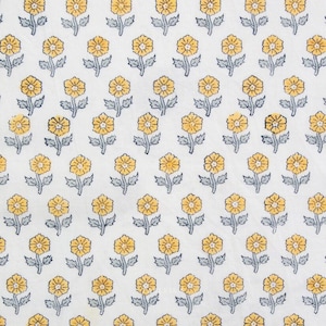 May include: White fabric featuring a repeating pattern of yellow flowers with grey leaves and stems. The flowers are evenly spaced, creating a consistent design. The floral pattern is a classic design, suitable for various applications.