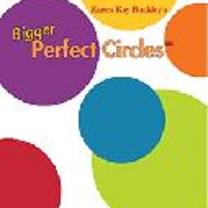 May include: A colourful album cover with the title "Bigger Perfect Circles" in white text on a purple circle. The album cover features a variety of coloured circles in the background.