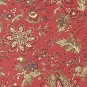 May include: A close-up of a red fabric with a floral pattern. The design features large, stylized flowers in shades of red, pink, and olive green, along with smaller floral and leaf elements. The background is a solid red color.