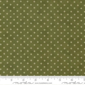 May include: Green fabric with a white floral pattern. The fabric has a subtle texture and a vintage feel.