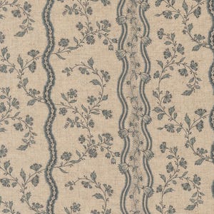 May include: A fabric with a repeating floral pattern. Vertical stripes with a wavy border in a muted blue-grey colour. Delicate vines with small flowers and leaves fill the space between the stripes, set against a beige background. Ideal for upholstery or soft furnishings.