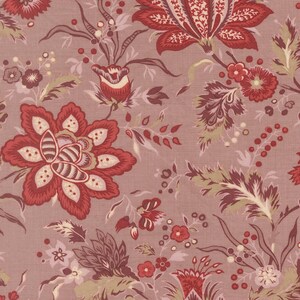 May include: A close-up of a floral fabric with a repeating pattern. The design features large, stylized flowers in shades of red and burgundy, with cream and green accents, set against a muted mauve background. The fabric has a textured appearance.
