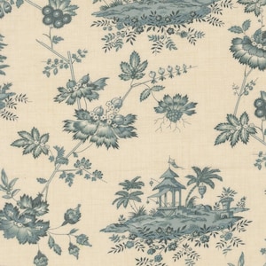 May include: Cream-colored fabric with a blue floral toile pattern. The design features detailed illustrations of flowers, leaves, and a pagoda scene. The fabric has a classic, vintage aesthetic.
