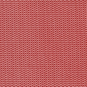 May include: Red fabric with a white wavy pattern. The pattern is made up of small, repeating shapes that resemble leaves.