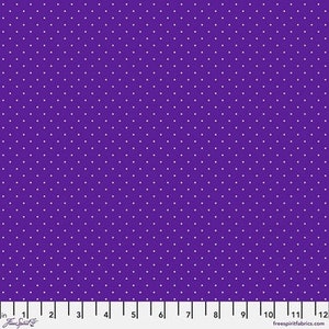 May include: Purple fabric with a white polka dot pattern. The fabric is shown with a ruler for scale.