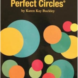 May include: A colourful set of overlapping circles in shades of yellow, orange, green, blue, and red on a black background. The circles are arranged in a random pattern, creating a visually appealing design.