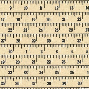 May include: A close-up of a ruler with black markings on a beige background. The ruler shows numbers from 9 to 30 in inches.
