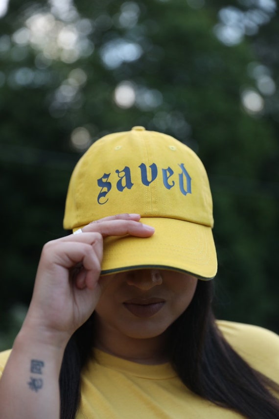 mustard yellow baseball cap