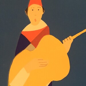 May include: A person wearing a red hat and a blue and red costume plays a yellow guitar against a blue background.