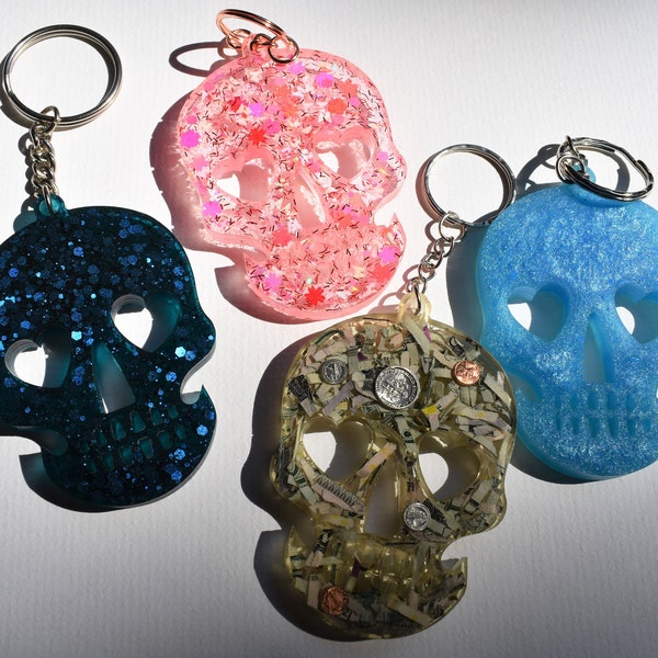 Skull with heart eyes resin keychain - pastel blue shimmery skull keychain - black and pink holographic glitter skull keychain