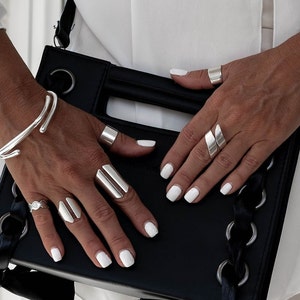 Silver-plated statement ring set. Adjustable silver chunky rings
