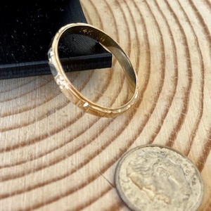 Wedding band, 14k yellow gold, size 10 1/2