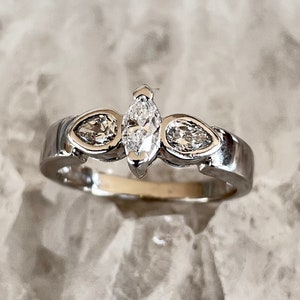 3 stone diamond ring, 3/4 carats, 14 k white gold, size 6 3/4