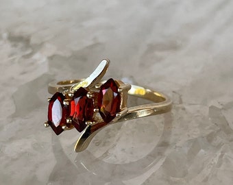 Garnet 3 stone ring, 10k yellow gold, marquis garnets, size 6 3/4