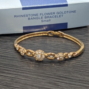 AVON Rhinestone Flower Bangle Bracelet Size Small 2001 Avon Golden Cubic Zirconia Rhinestone Flowers Bangle Bracelet Avon New Old Stock 75
