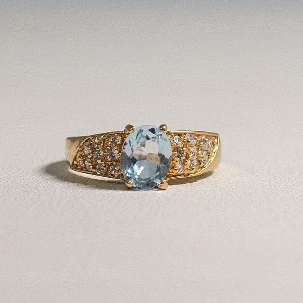 Vintage Signed 14k HGE LIND CFJ Yellow Gold Finish Ring With Sky Blue Topaz And Clear Stones. Size 10 by Gio Lind