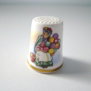 Dé à coudre Royal Doulton « Balloon Seller » en porcelaine tendre bordée d&#39;or Angleterre