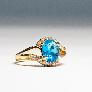 Blue and Clear CZ Ring Birthstone December 14Kt HG Electroplated Yellow Gold Size 6 1/2 Cocktail Ring