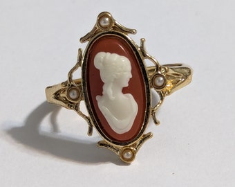 Vintage Avon Cameo Ring Size 7 to 8 1/2 Adjustable Avon 1978 Gold Tone Oval Coral Pearl Cameo Fashion Costume Ring New Old Stock