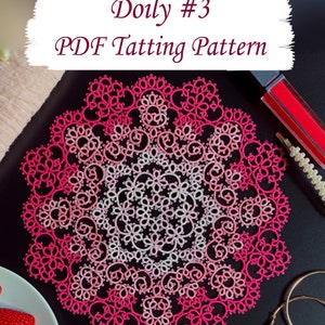 May include: A pink and white doily with a delicate, intricate design. The doily is made with a tatting technique and is a beautiful example of handmade lace. The image includes the text "Doily #3 PDF Tatting Pattern" and "© Gail Weaver".