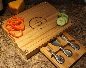 Deluxe Personalized Cutting Board with Cheese Cutlery Set with Glass & Bamboo Engraving Options (Each 13" x 10") See Additional Images