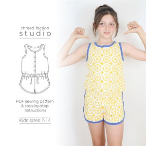 May include: A sewing pattern for a sleeveless jumpsuit with a lemon print. The pattern includes instructions for sizes 2-14. The pattern is shown on a young girl wearing the jumpsuit.