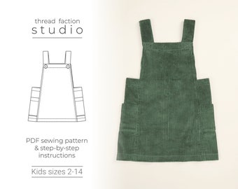 May include: A green corduroy overall dress with pockets and straps. The dress is a sewing pattern for kids sizes 2-14. The text "thread faction studio" is at the top of the image.