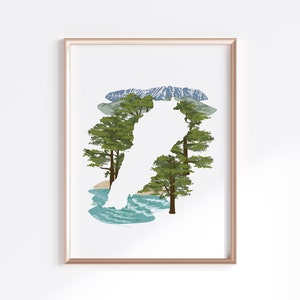 May include: A framed print of a silhouette of a person standing in front of a mountain landscape with trees and a river. The silhouette is white, and the background is a colorful illustration of a mountain scene.