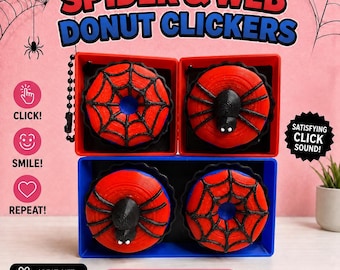 Puede incluir: Cuatro fidget clickers con forma de dónut en rojo y negro, con patrones de telaraña y figuras de arañas negras. Los artículos están en recipientes de plástico rojo y azul. El texto dice SPIDER & WEB DONUT CLICKERS, CLICK!, SMILE!, REPEAT!, SATISFYING CLICK SOUND! y GREAT GIFT FOR ALL AGES!