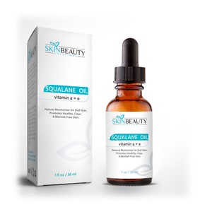 May include: A brown glass bottle with a black dropper top containing squalane oil with vitamins A and E. The bottle is labeled "SkinBeauty Solutions Squalane Oil vitamin a + e Natural Moisturizer for Dull Skin. Promotes Healthy, Clear, & Blemish-Free Skin. 1 oz / 30 ml".