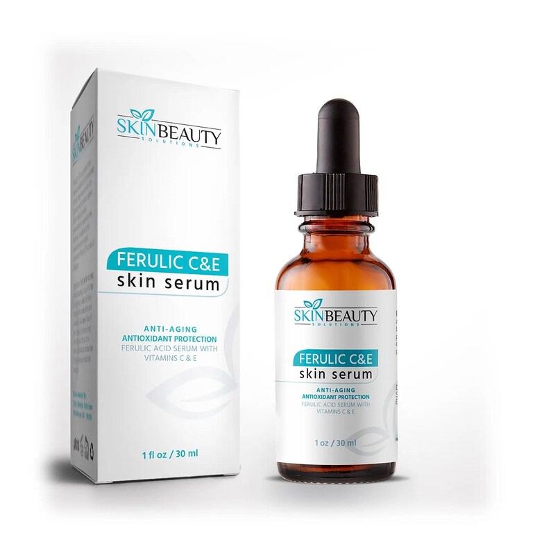 May include: A brown glass bottle with a black dropper top containing Ferulic C&E skin serum. The bottle is labelled with the text "Skin Beauty Solutions" and "Ferulic C&E skin serum". The label also states that the serum is anti-aging and provides antioxidant protection. The bottle contains 1 fl oz / 30 ml of serum.