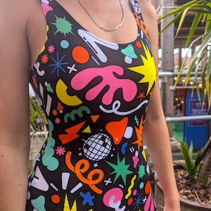 Kapow UV Catsuit, Leotard, Unitard. Sleeveless low back spandex print. Perfect for; Burning Man, festival, rave, UV