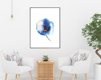 May include: A watercolor painting of a blue flower with pink and white accents. The flower is on a white background and is framed in a black frame.