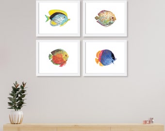 May include: Set of four framed watercolor paintings of colorful fish. Each painting features a different species of fish with intricate details and vibrant colors.
