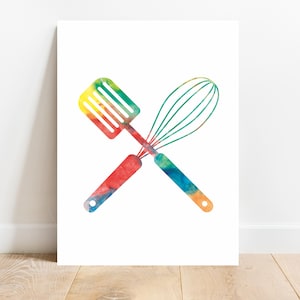 May include: A watercolor illustration of a spatula and whisk crossed over each other. The utensils are painted in a rainbow of colors, including red, orange, yellow, green, blue, and purple.