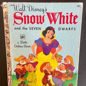 May include: A vintage children's book cover featuring Snow White and the Seven Dwarfs. The cover is blue with a red title and illustrations of Snow White and the dwarfs.