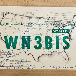 May include: A vintage postcard with a green map of the United States. The text on the postcard reads "WN3BIS" and "My QTH". The postcard also includes the text "Hack Eltonhead, Jr., 2040 Lardner St., Phila. Pa 19149".