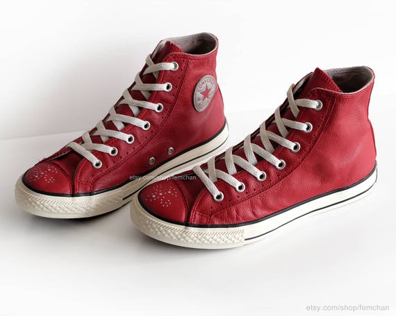 red converse with cheetah print tongue