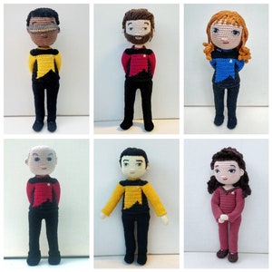 May include: A set of ten crocheted Star Trek characters. The characters are all wearing the Starfleet uniform in different colors. The characters include Captain Kirk, Spock, Uhura, Scotty, Sulu, Chekov, and others.