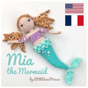 May include: A crocheted mermaid doll named Mia, with long brown hair, a purple top, and a turquoise tail. The doll is lying on a white background with the text "Mia the Mermaid by littleBeauMouse".