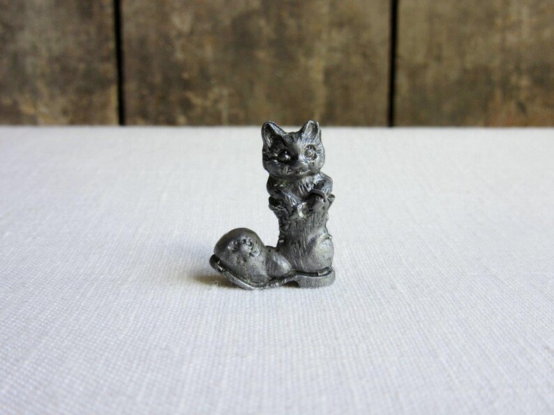 tiny pewter figurines