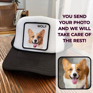 May include: A black and white trucker hat with a square patch showing a corgi dog portrait and the word "WOLF". The text "YOU SEND YOUR PHOTO AND WE WILL TAKE CARE OF THE REST!" is also visible.