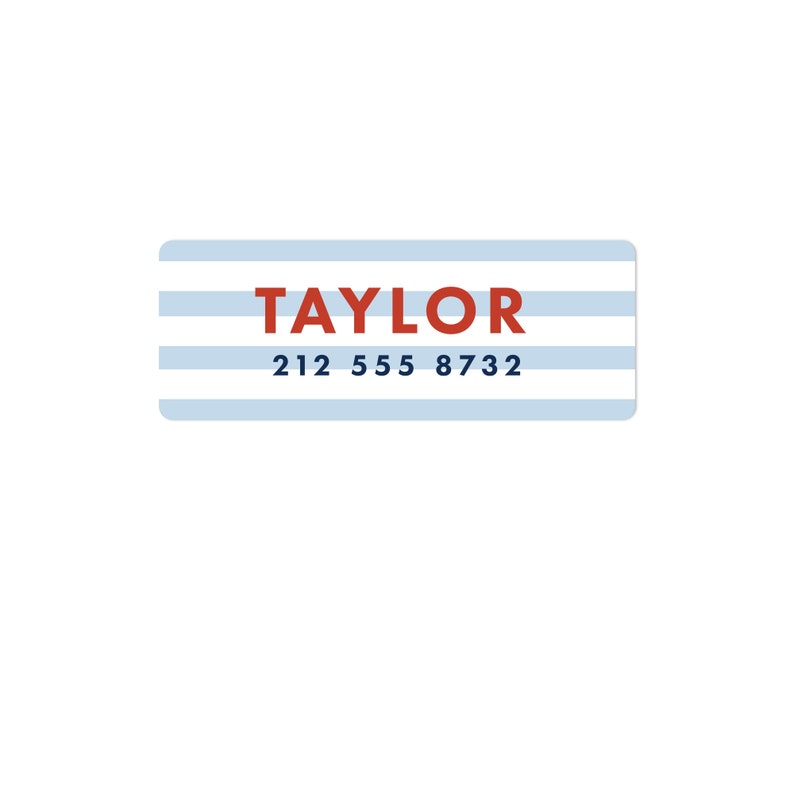 May include: A blue and white striped label with the name "TAYLOR" in red text and the phone number "212 555 8732" in blue text.