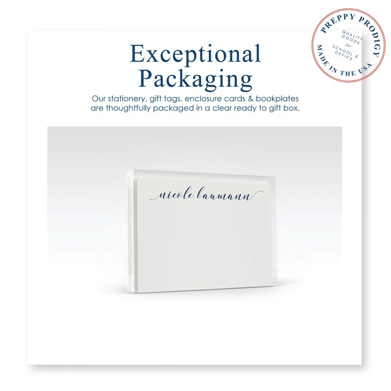 May include: A white box with a clear front panel, showing a stack of personalized stationery with the name "nicole baumann" printed in blue ink. The box is sitting on a white surface. The text "Exceptional Packaging" is printed above the box.