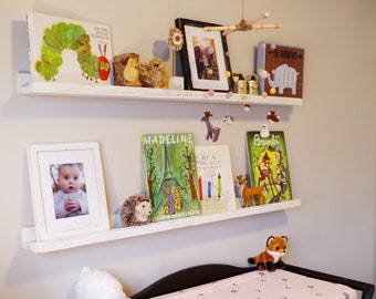 baby room floating shelves