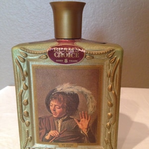 Vintage 1971-72 Jim Beam Boy Holding a Flute Bottle