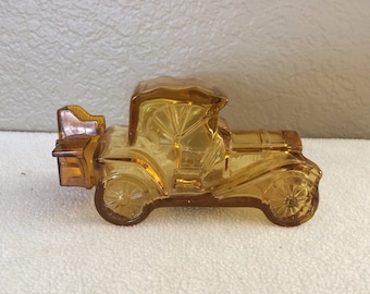 Kolekcjonerska butelka wody kolońskiej Avon Packard Roadster Oland 6 uncji, pusta, bursztynowa