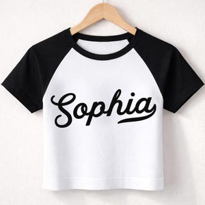 Koszulka damska z krótkim rękawem, raglan Bella Canvas 1201, dopasowana, damska, Studio Merch Boutique, krótki top