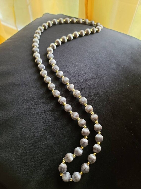 Gorgeous Grey Silk and Gold beaded necklace .